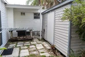a view of a back yard of the house