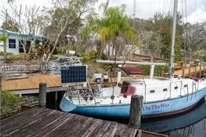 a view of outdoor space yard swimming pool and sitting area