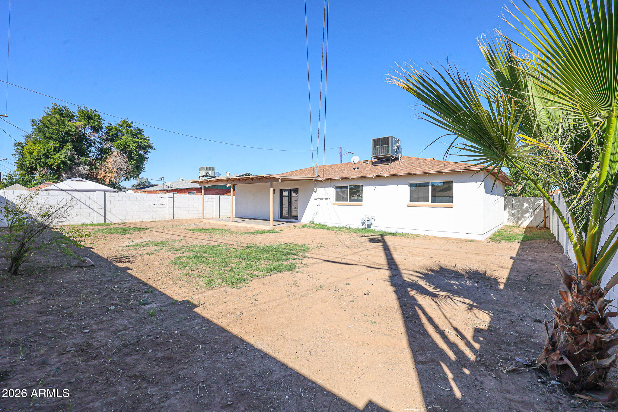 3337 West Ocotillo Road Phoenix, AZ 85017 - Photo 27 of 30 a front view of a house with a yard