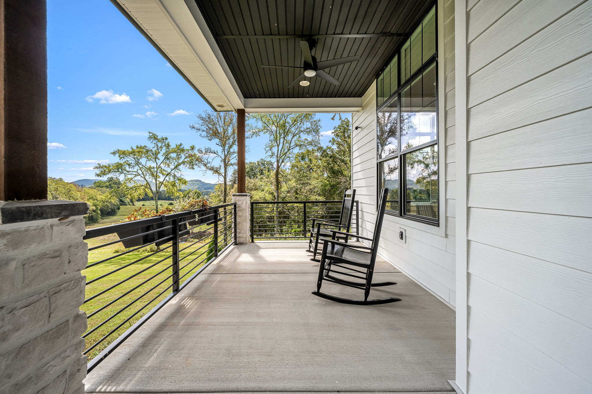 1425 Fuston Hollow Road Auburntown, TN 37016 - Photo 11 of 100 a view of a chairs and table in the balcony