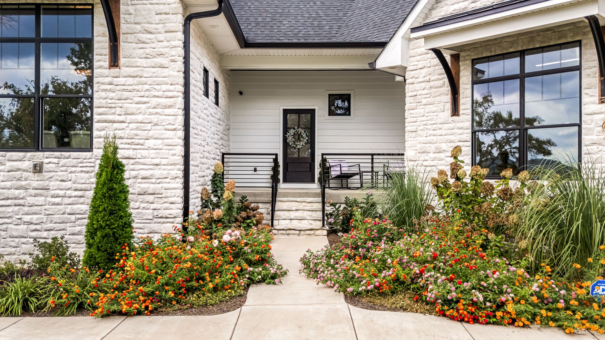 1425 Fuston Hollow Road Auburntown, TN 37016 - Photo 16 of 100 a potted plant sitting in front of a house