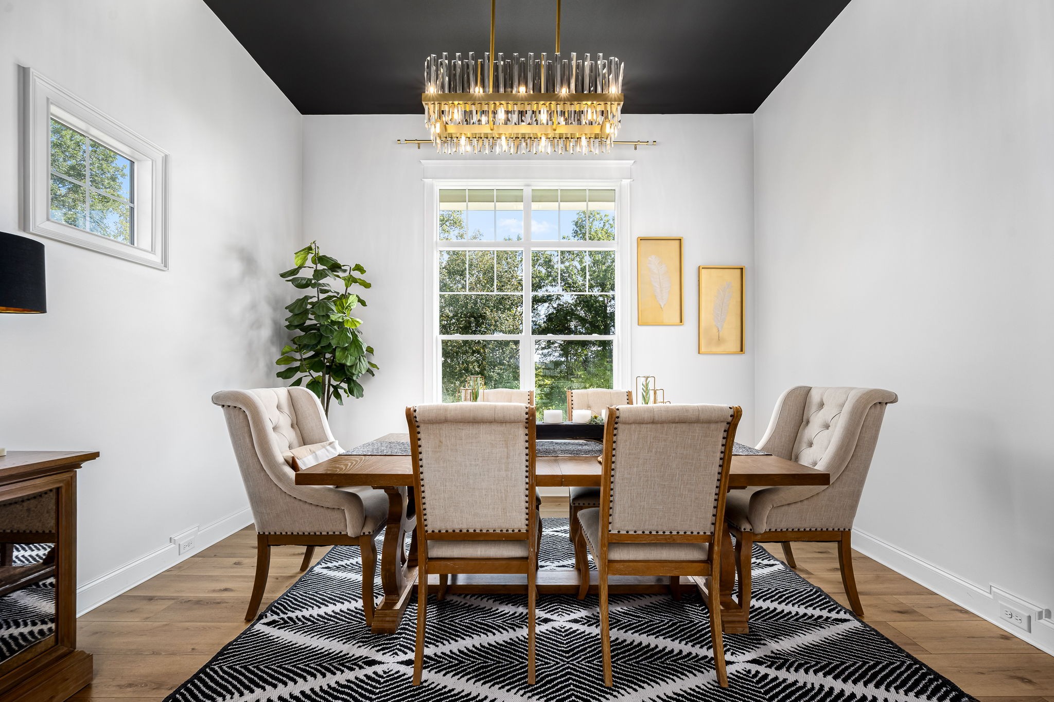 1425 Fuston Hollow Road Auburntown, TN 37016 - Photo 22 of 100 a dining room with furniture a rug and a chandelier