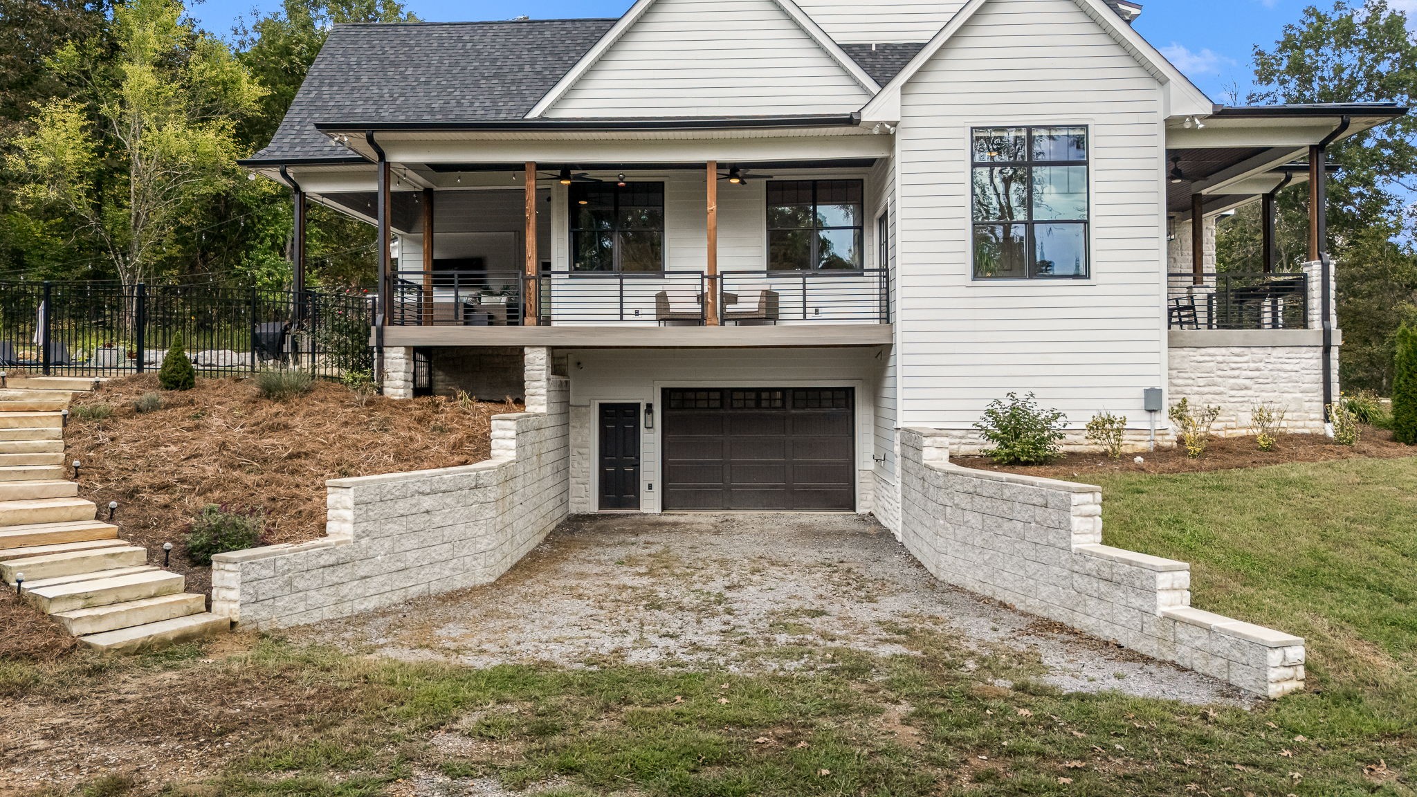 1425 Fuston Hollow Road Auburntown, TN 37016 - Photo 3 of 100 a view of a house with a yard and sitting area