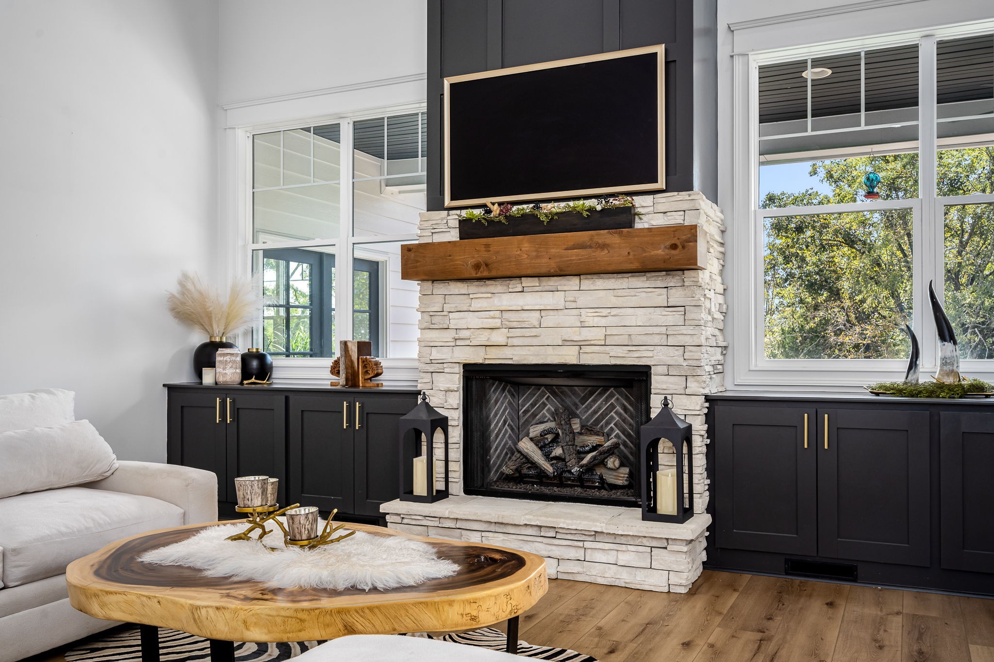 1425 Fuston Hollow Road Auburntown, TN 37016 - Photo 31 of 100 a living room with furniture a flat screen tv and a fireplace