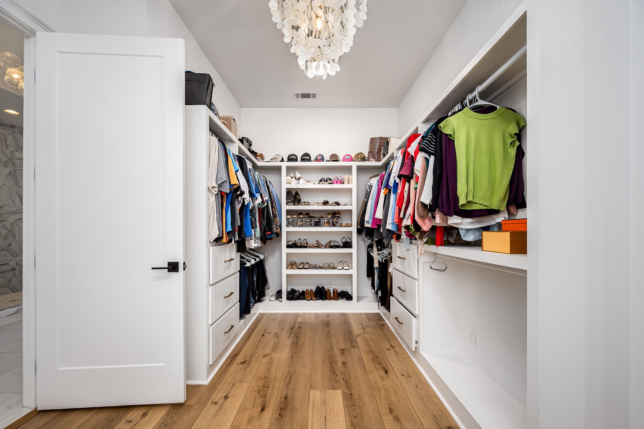 1425 Fuston Hollow Road Auburntown, TN 37016 - Photo 61 of 100 a view of walk in closet with clothes and shoes