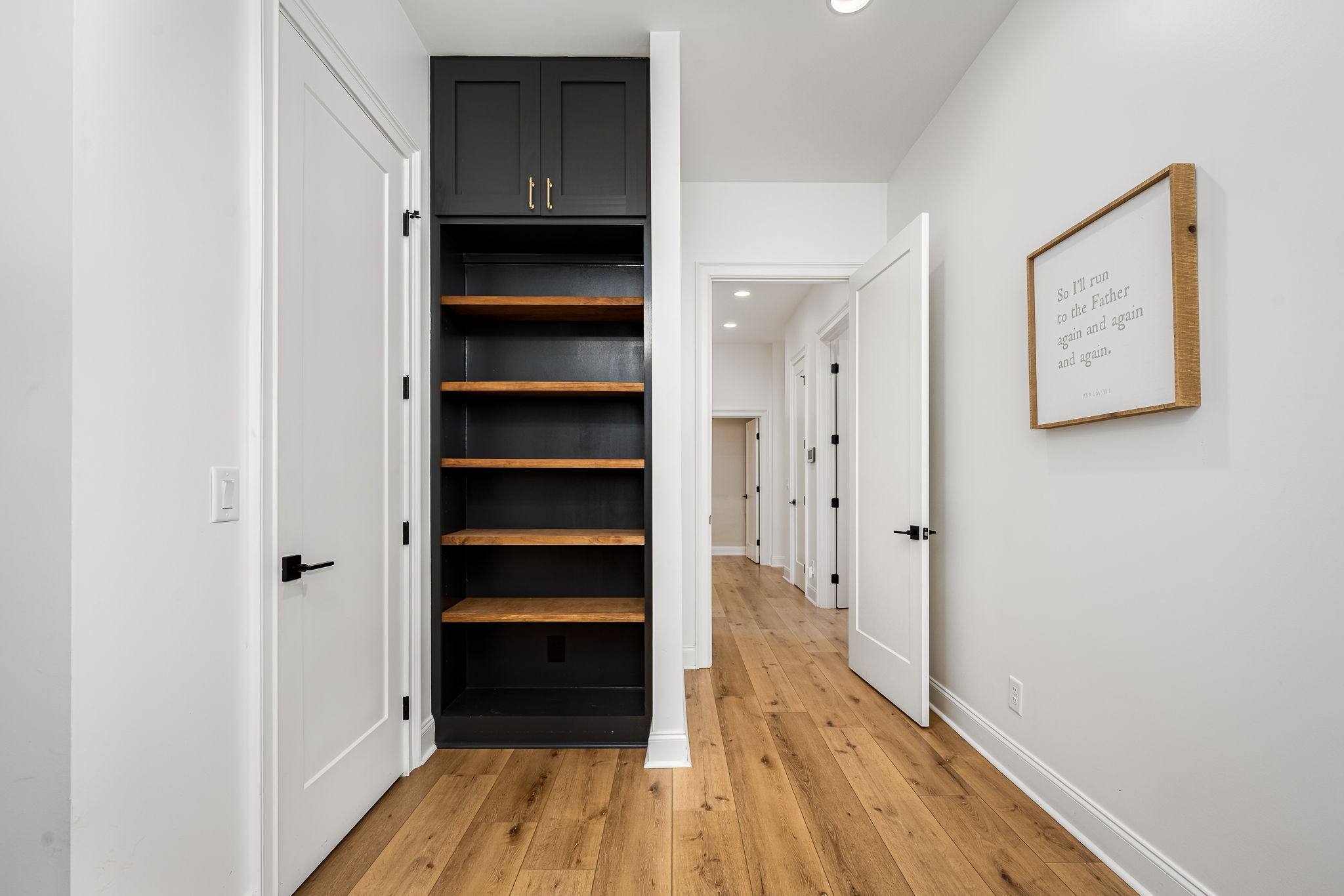 1425 Fuston Hollow Road Auburntown, TN 37016 - Photo 66 of 100 a view of walk in closet with wooden floor
