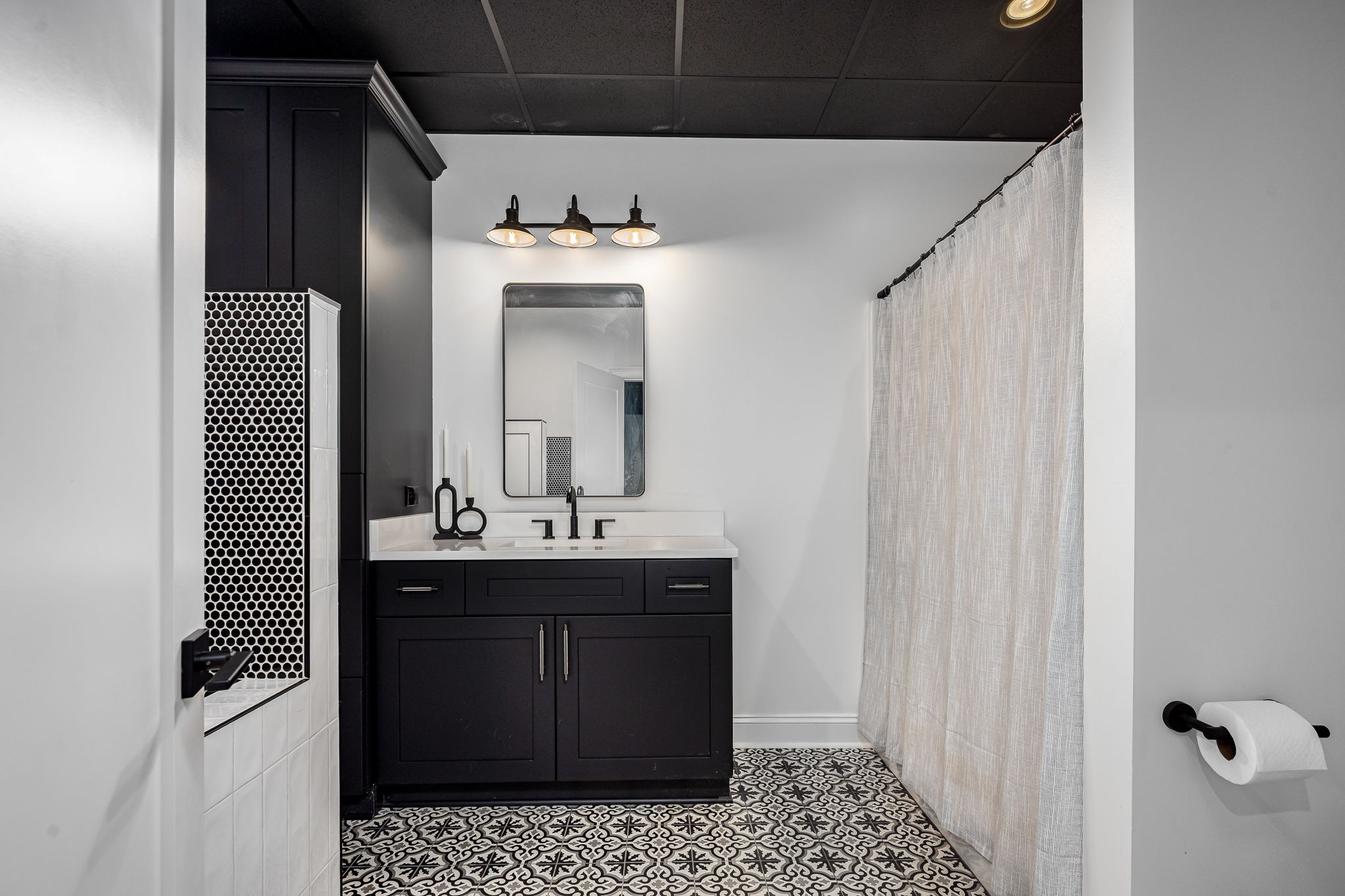 1425 Fuston Hollow Road Auburntown, TN 37016 - Photo 76 of 100 a bathroom with a sink a mirror and vanity