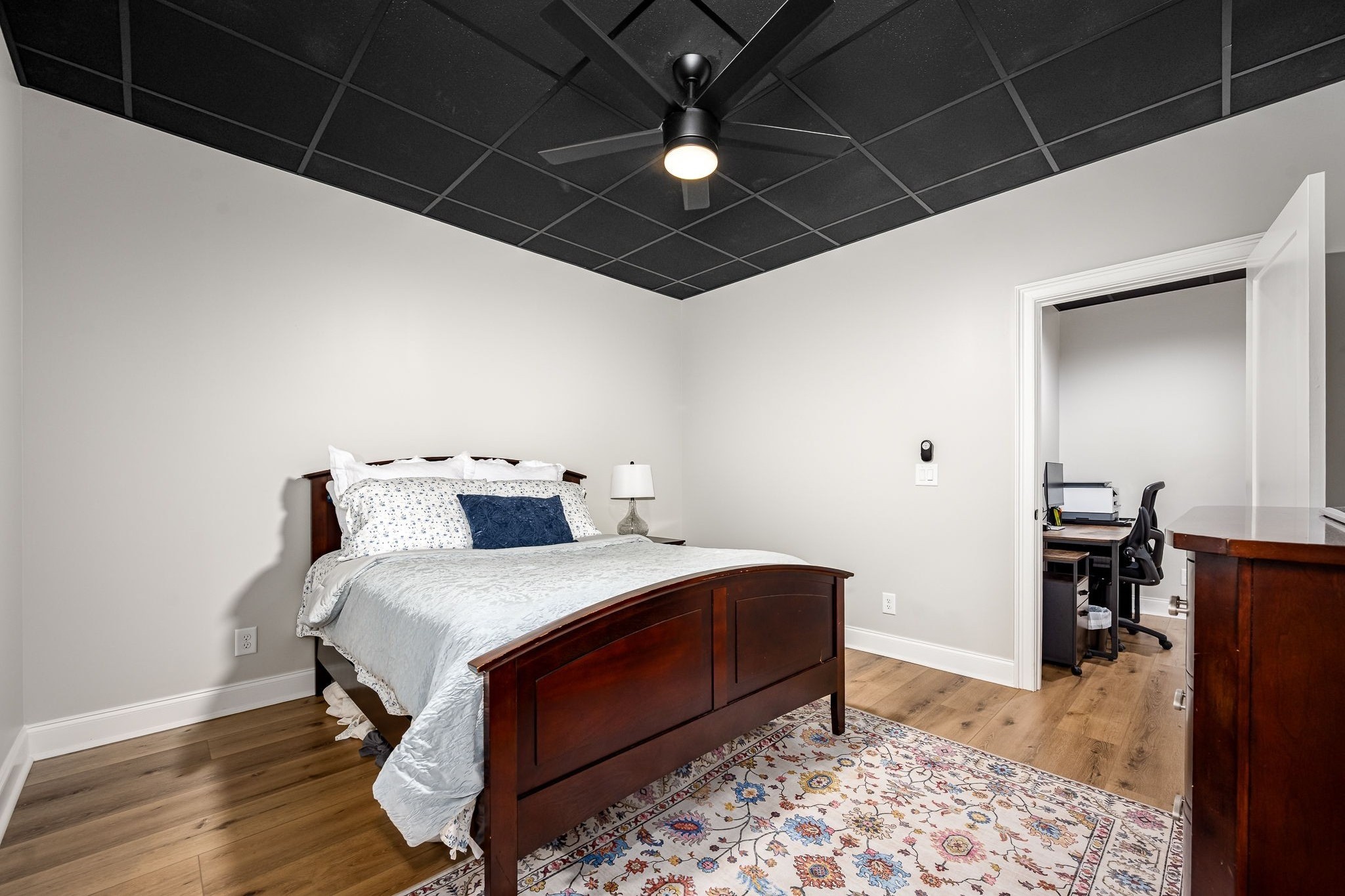 1425 Fuston Hollow Road Auburntown, TN 37016 - Photo 81 of 100 a bedroom with a bed and a table in it