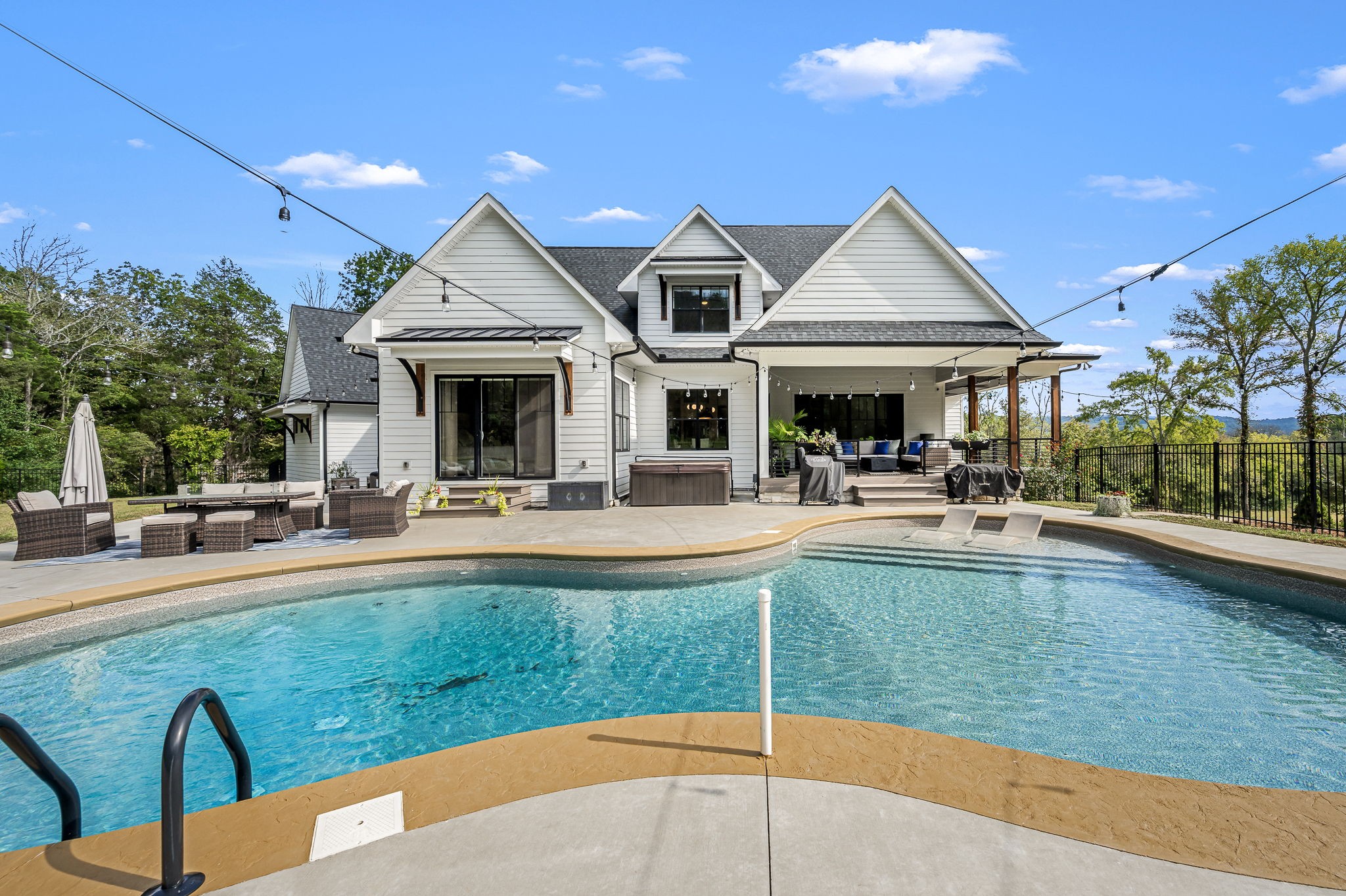 1425 Fuston Hollow Road Auburntown, TN 37016 - Photo 95 of 100 a view of a house with swimming pool and sitting area