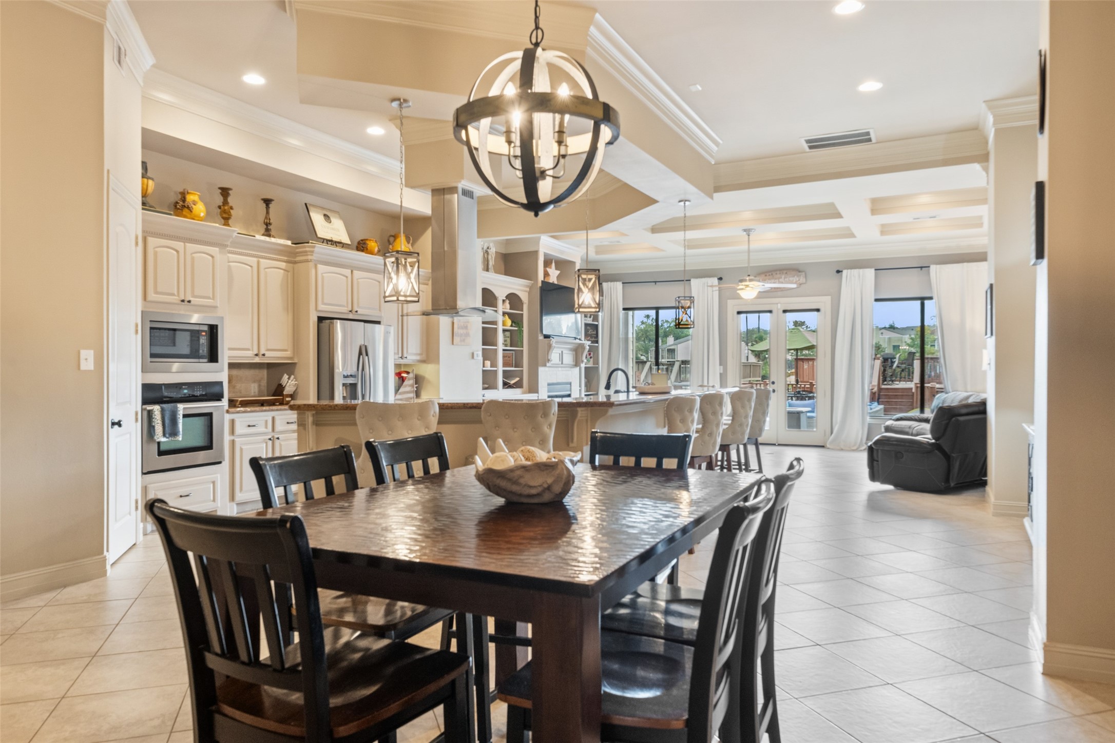 255 Capetown Way Conroe, TX 77356 - Photo 13 of 30 a view of a dining room with furniture window and wooden floor