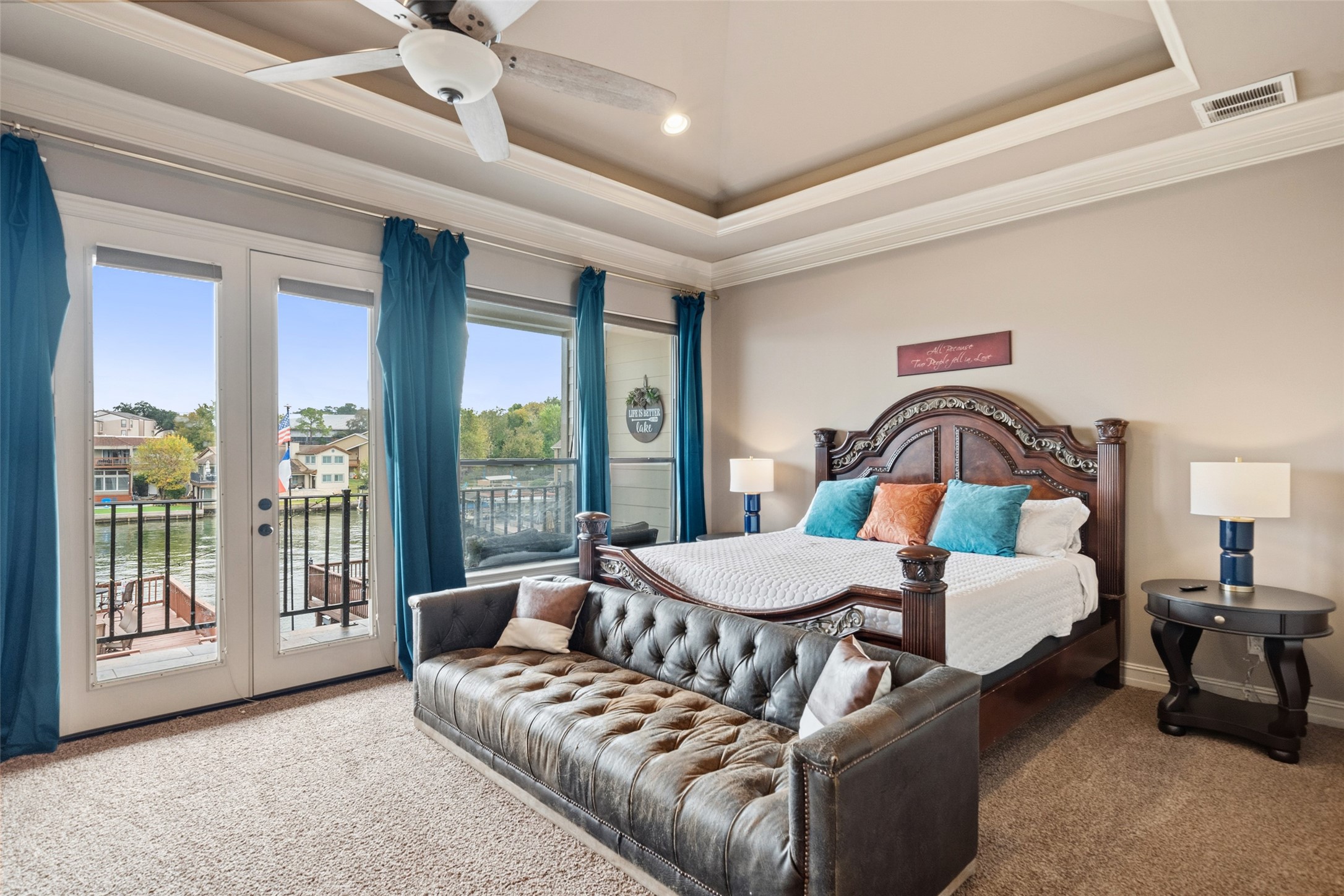 255 Capetown Way Conroe, TX 77356 - Photo 19 of 30 a bedroom with furniture and a large window