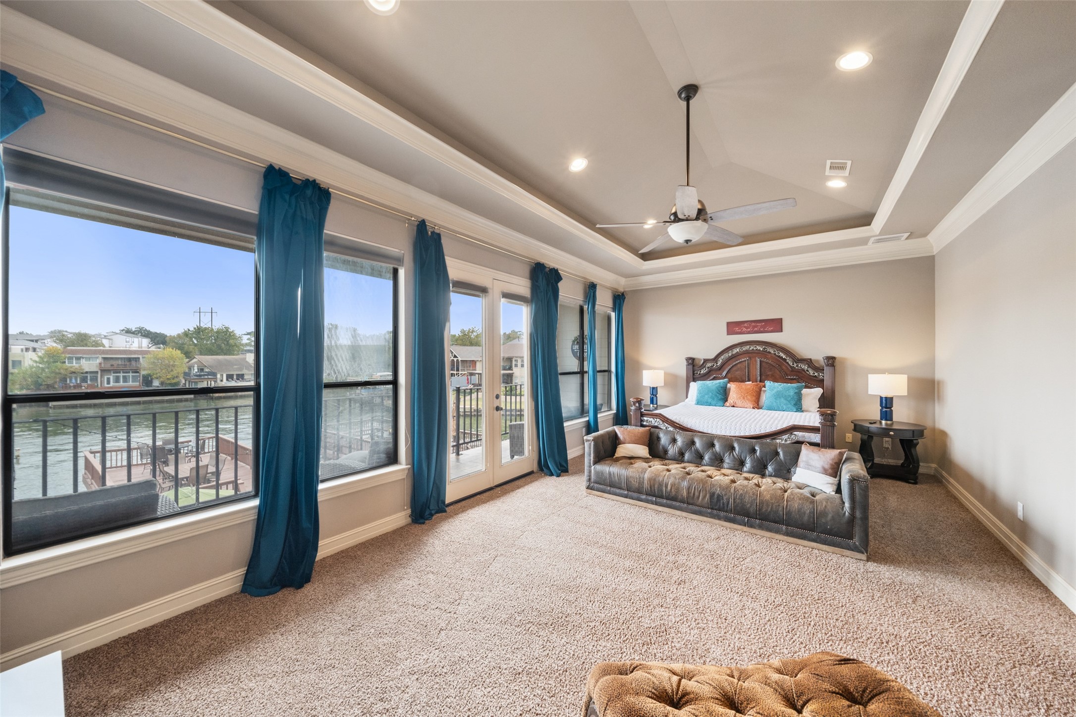 255 Capetown Way Conroe, TX 77356 - Photo 20 of 30 a spacious bedroom with a bed and a large window