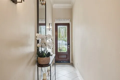a view of a hallway and dining room