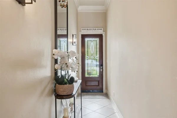 a view of a hallway and dining room