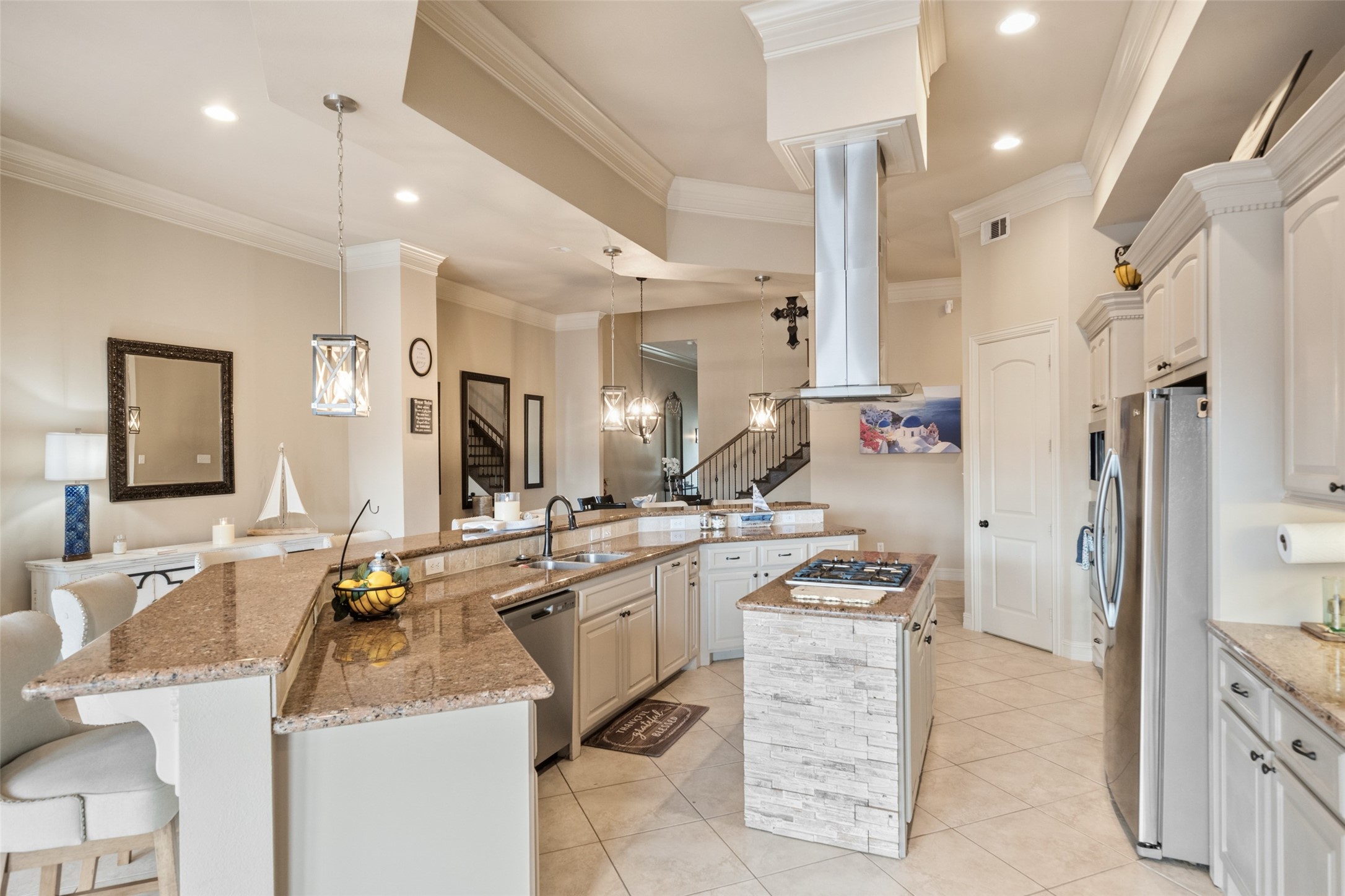 255 Capetown Way Conroe, TX 77356 - Photo 7 of 30 a kitchen with a sink stove and cabinets