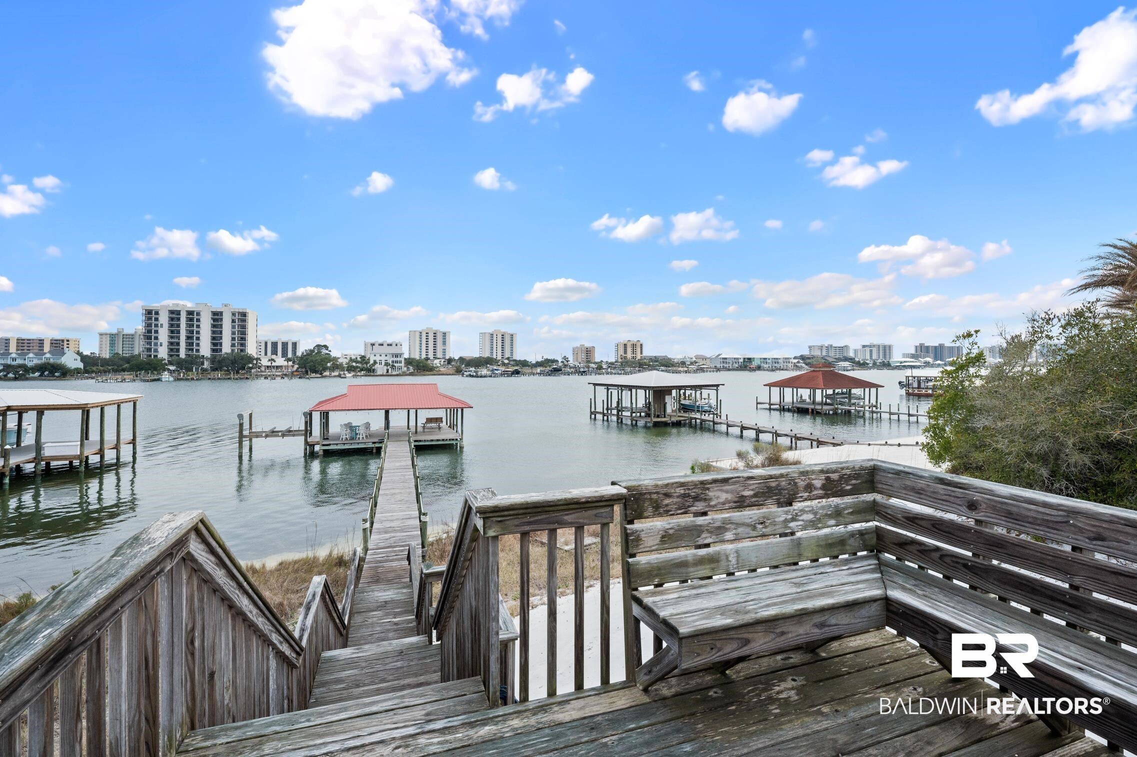 30388 River Road Orange Beach, AL 36561 - Photo 39 of 72 View of dock featuring a water view and a city view