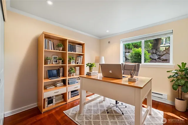 a workspace with furniture and a window
