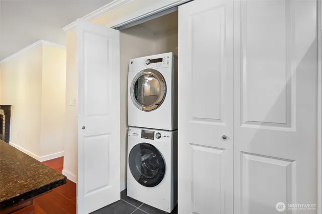 a view of a hallway with washer and dryer