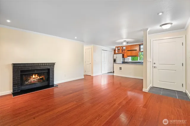 a view of a kitchen with a sink and a stove top oven