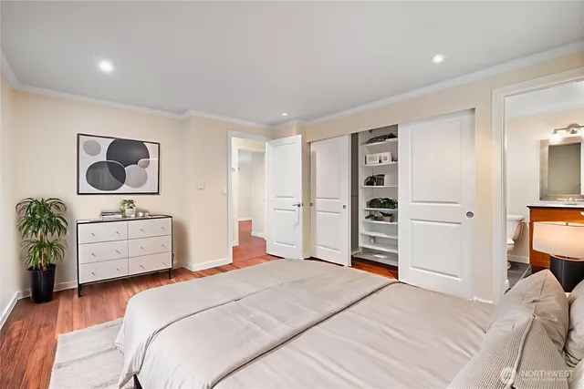 a bedroom with a bed and furniture