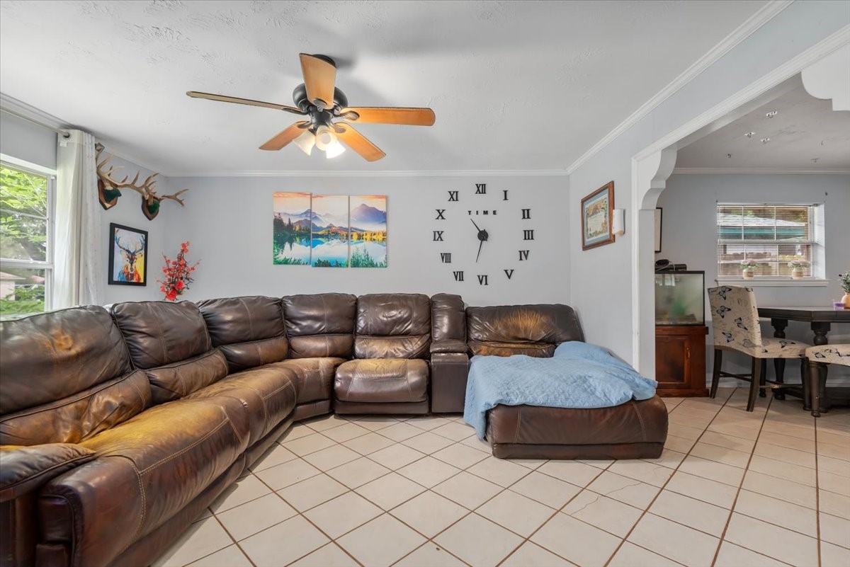 23011 Bayleaf Drive Spring, TX 77373 - Photo 5 of 22 a living room with furniture and a window