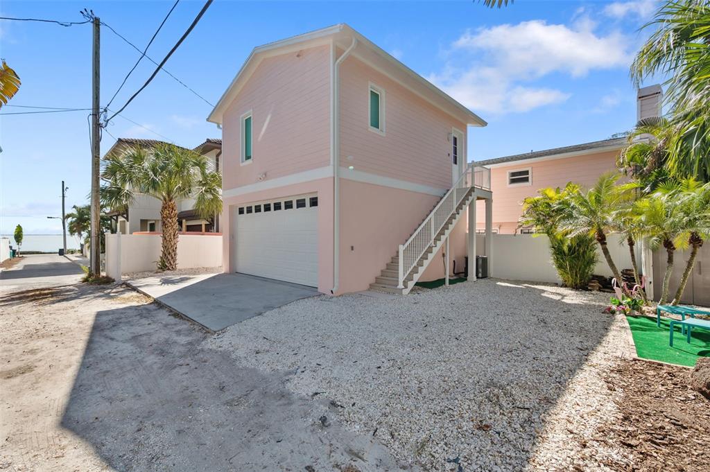 345 Bailey Street, Unit A Safety Harbor, FL 34695 - Photo 14 of 21 a view of a house with a yard