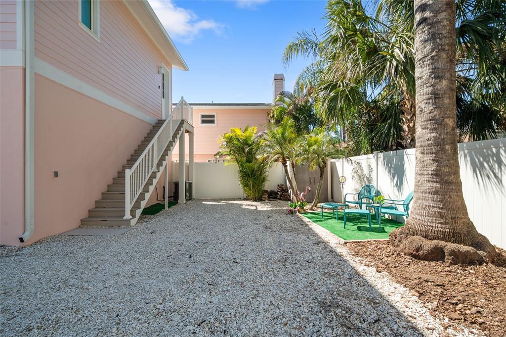 345 Bailey Street, Unit A Safety Harbor, FL 34695 - Photo 17 of 21 a view of a house with a yard