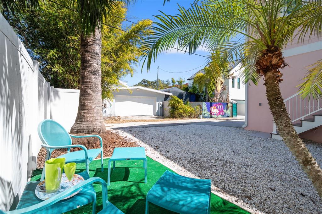 345 Bailey Street, Unit A Safety Harbor, FL 34695 - Photo 19 of 21 a backyard of a house with lots of green space