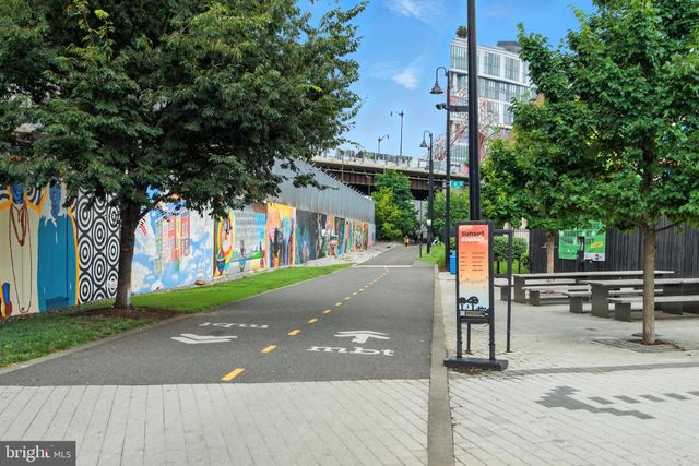 a view of a building with sitting area
