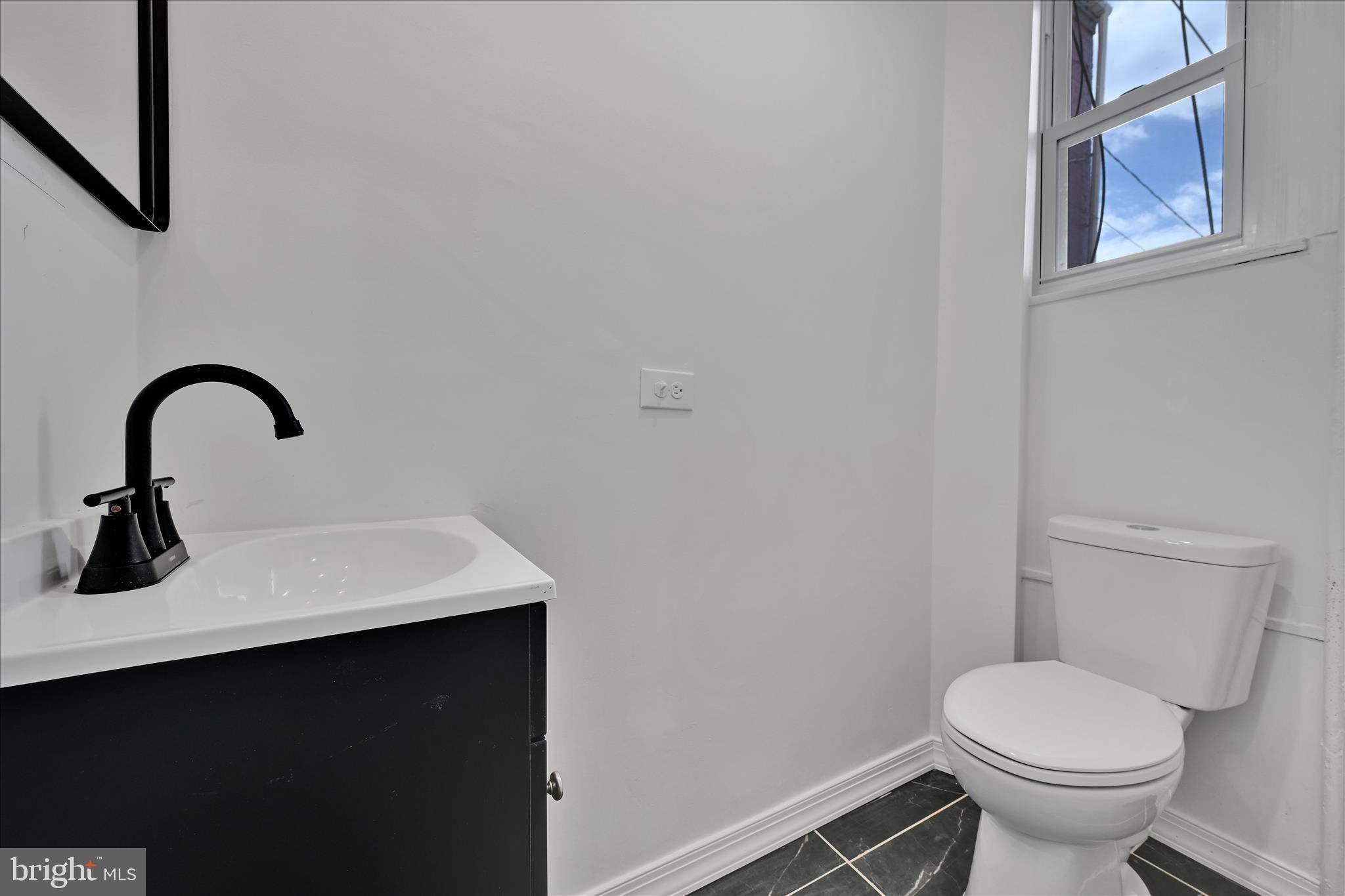 436 Locust Street Reading, PA 19604 - Photo 11 of 26 Powder Room