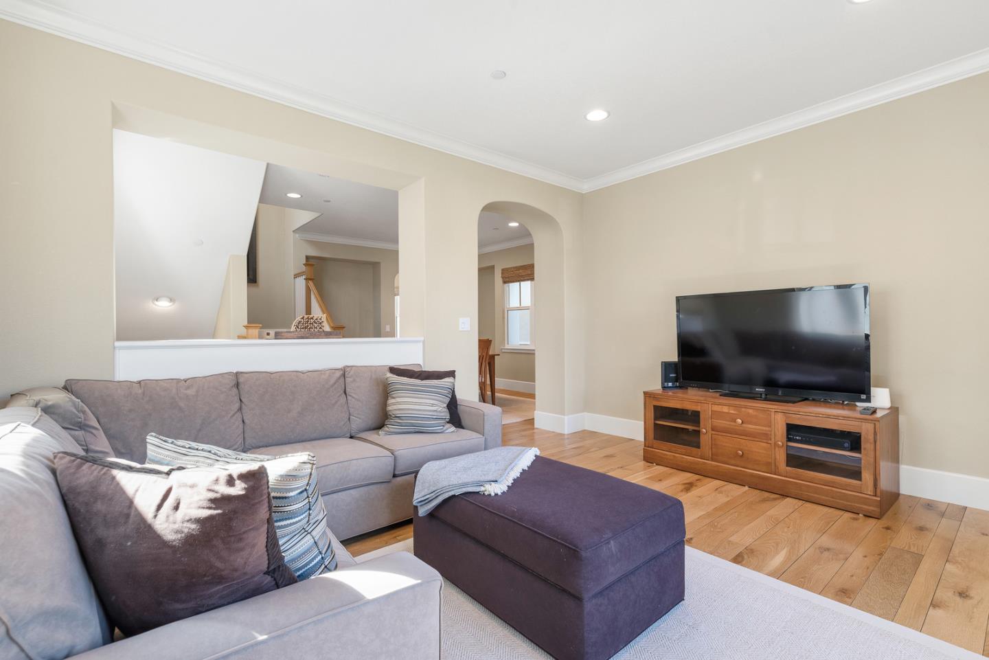 107 Savannah Loop Mountain View, CA 94043 - Photo 15 of 29 a living room with furniture and a flat screen tv