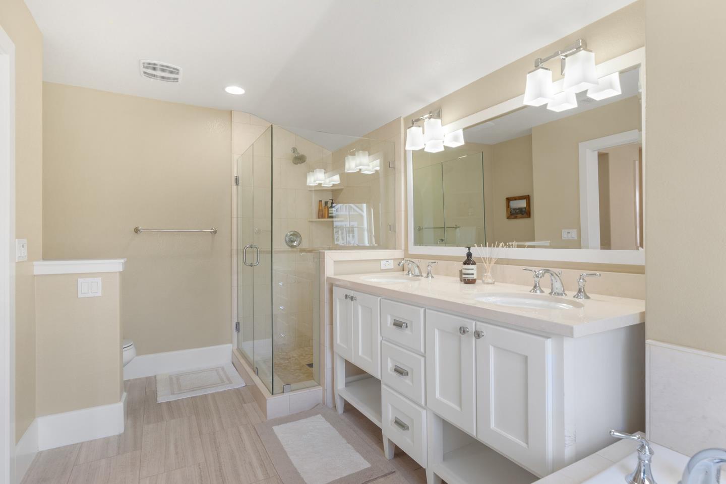 107 Savannah Loop Mountain View, CA 94043 - Photo 19 of 29 a bathroom with a double vanity sink mirror and shower