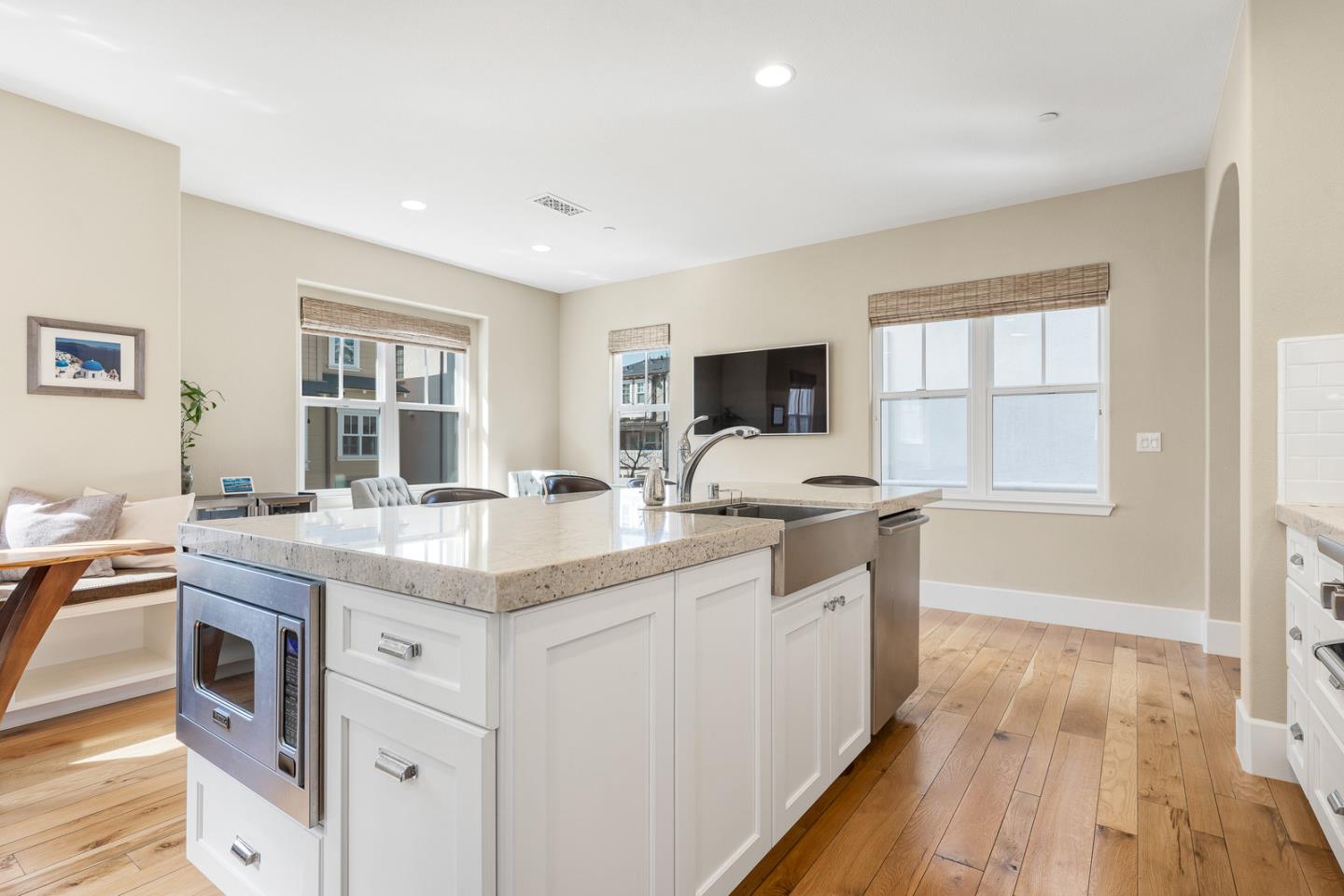 107 Savannah Loop Mountain View, CA 94043 - Photo 8 of 29 a kitchen with a sink stove and cabinets