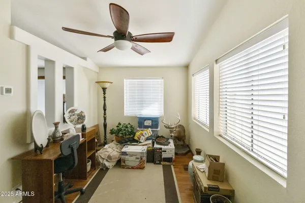a living room with furniture and a window