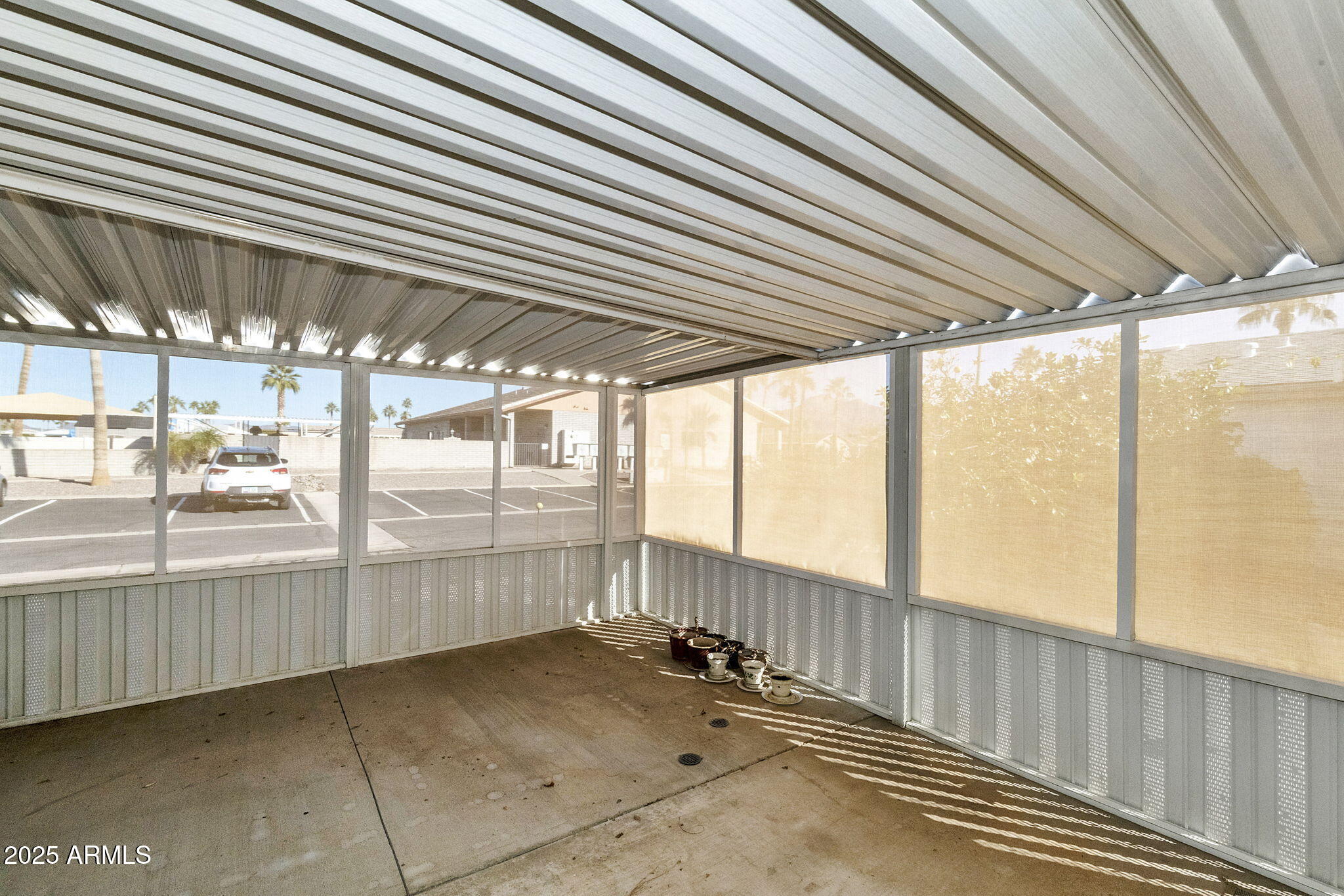 3700 South Tomahawk Road, Unit 83 Apache Junction, AZ 85119 - Photo 16 of 31 a view of an empty room with windows