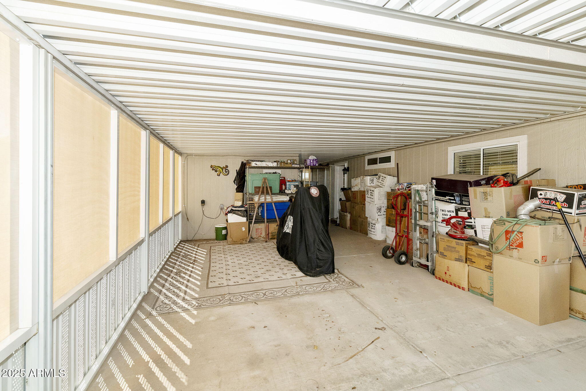 3700 South Tomahawk Road, Unit 83 Apache Junction, AZ 85119 - Photo 17 of 31 a view of a storage room with furniture