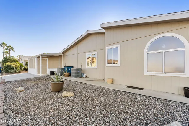 a backyard of a house with seating space