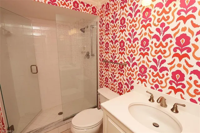 a bathroom with a sink and toilet