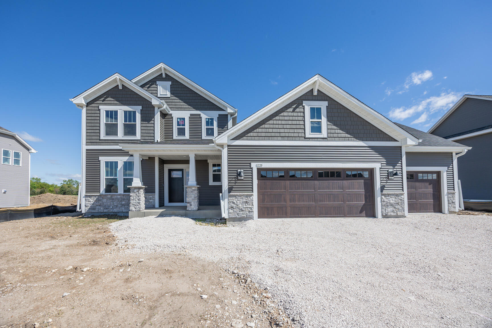 1750 Switchgrass Street Oconomowoc, WI 53066 - Photo 2 of 43 Curb appeal