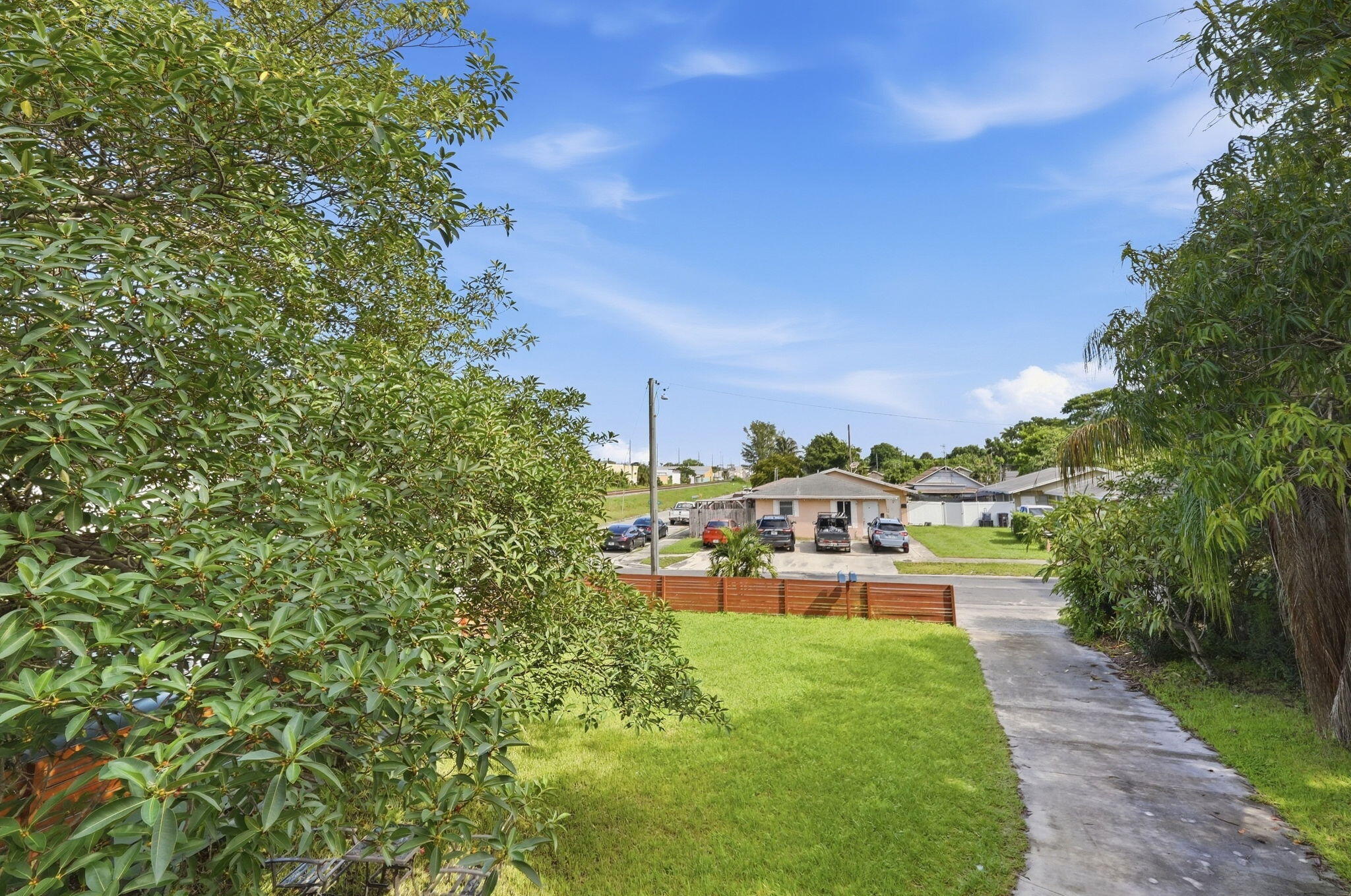 528 Churchill Road West Palm Beach, FL 33405 - Photo 34 of 38 528_UL Outdoor View_001