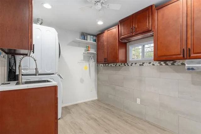 a view of a kitchen with a sink