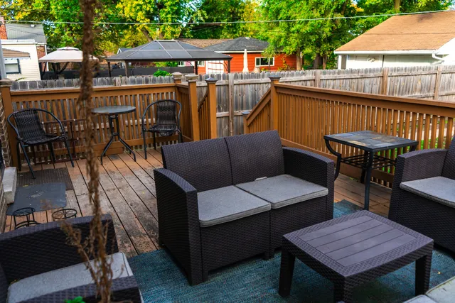 a view of an outdoor sitting area with furniture