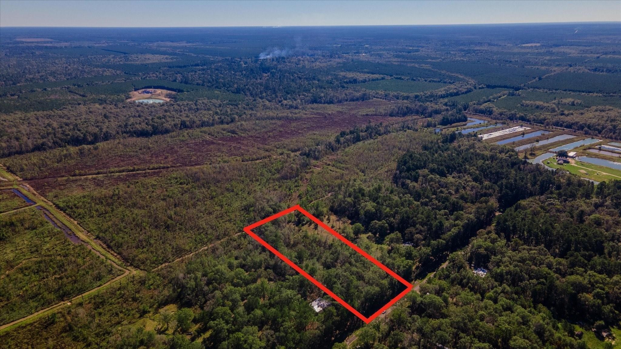 1234 County Road 2145 Cleveland, TX 77327 - Photo 13 of 15 a view of outdoor space