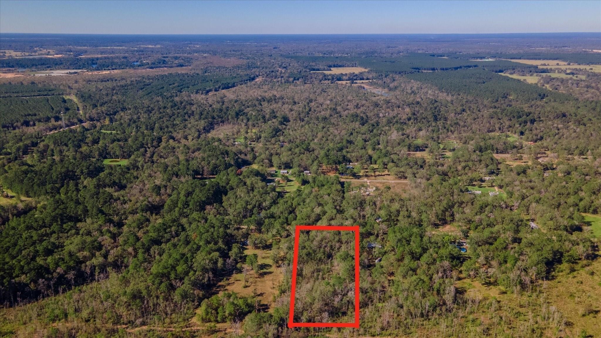 1234 County Road 2145 Cleveland, TX 77327 - Photo 3 of 15 a view of city and mountain