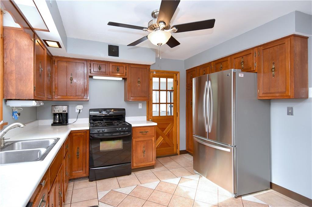 560 Tevebaugh Hollow Road Freedom, PA 15042 - Photo 11 of 23 Another view of the kitchen with access to the mudroom.