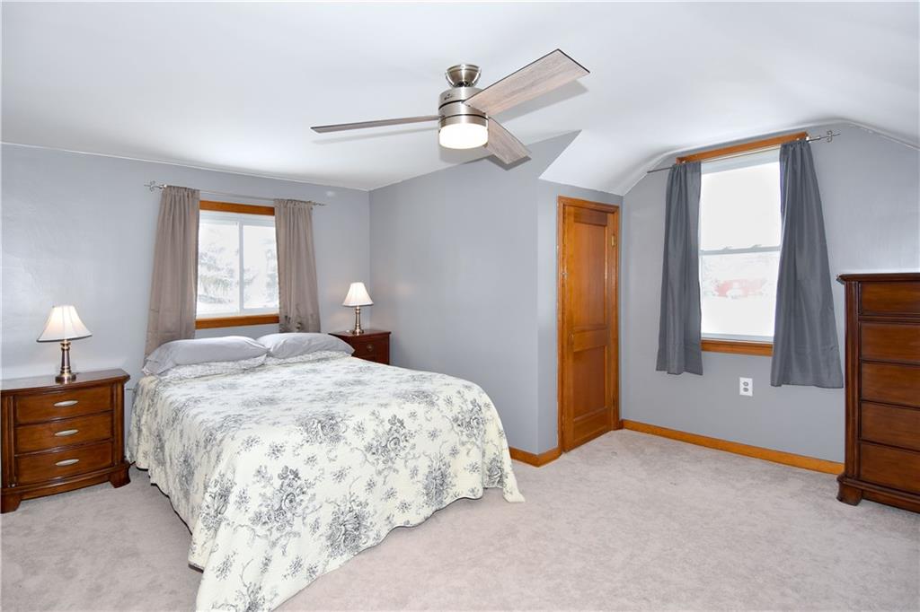 560 Tevebaugh Hollow Road Freedom, PA 15042 - Photo 14 of 23 The spacious master bedroom on the second floor features a modern ceiling fan.