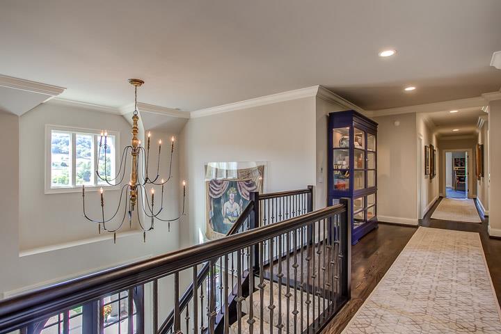 6664 Cross Keys Road College Grove, TN 37046 - Photo 18 of 29 Upstairs landing is spacious w/dark oak hardwood floors. Beautiful chandelier in the entry.