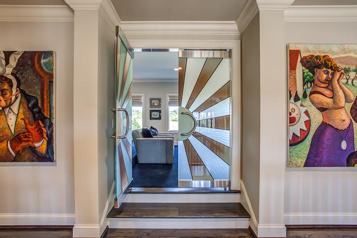 6664 Cross Keys Road College Grove, TN 37046 - Photo 19 of 29 Custom glass doors lead to the theater just off of the upstairs hallway.