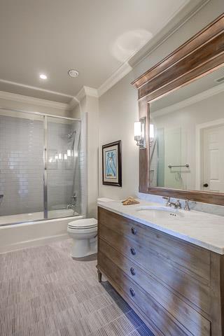 6664 Cross Keys Road College Grove, TN 37046 - Photo 21 of 29 Full bath with tiled floor, large vanity w/built-in framed mirror, tiled shower/tub combination w/glass door & walk-in closet.