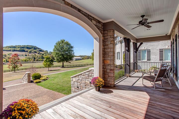 6664 Cross Keys Road College Grove, TN 37046 - Photo 3 of 29 Beautiful Tennessee Stone & brick exterior. Spacious front porch is Ipe decking & perfect for just relaxing & watching the sunset.